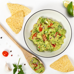Guacamole on white background. Selective focus.