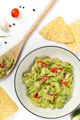 Guacamole on white background. Selective focus.