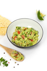 Guacamole on white background. Selective focus.