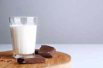 Glass of milk with chocolate chunks