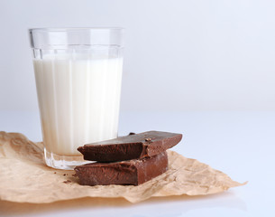 Glass of milk with chocolate chunks