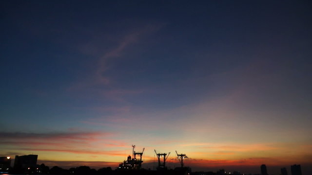 Titl shot cargo ship Chao phraya river twilight sky