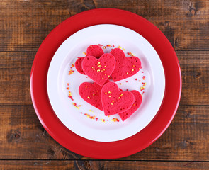 Cookies in form of heart in plate