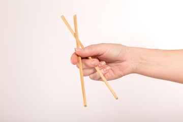 hand with chopsticks