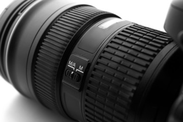 Camera lens on light background