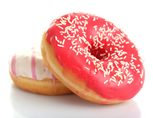 Delicious donuts with icing isolated on white