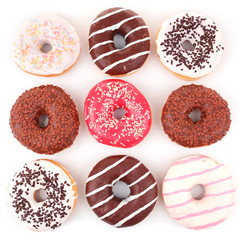 Delicious donuts with icing isolated on white