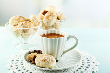 Cup of coffee and tasty cookies