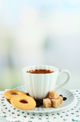 Cup of coffee and tasty cookies