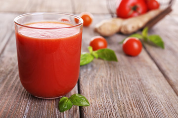 Glass of tomato juice with cherry tomatoes