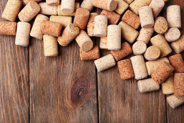 Wine corks on wooden background