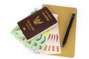 passport, cash, pen and book isolated on white background