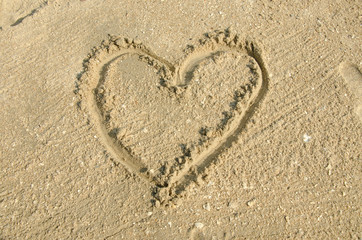 Beach background with hearts drawing