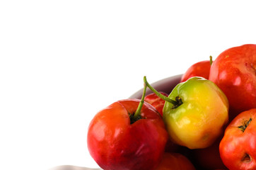 Cherries in cup isolated on white.