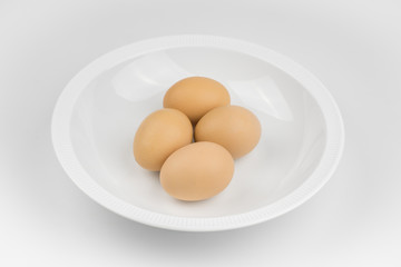 4 eggs in a bowl