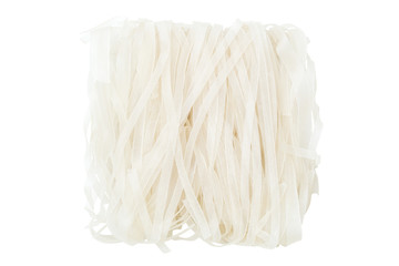 Closeup of block of dried rice noodles, isolated on white