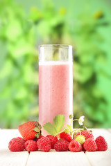 glass of smoothie in the garden