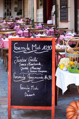 Menu board of French restaurant