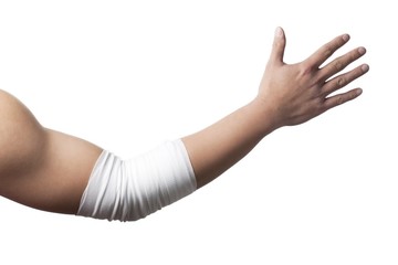 image of a white bandage on human elbow