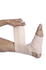 putting bandage on feet