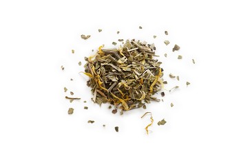 dried tea leaves over white background