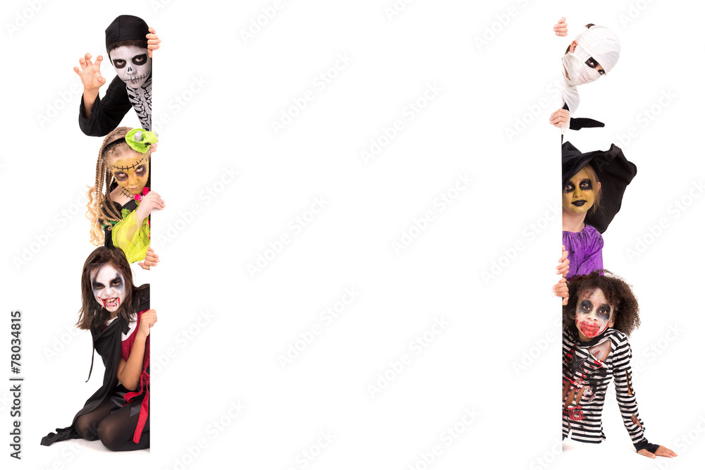 Wall mural Kids in Halloween costumes