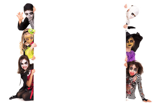 Kids in Halloween costumes