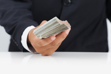 Businessman with huge amount of money