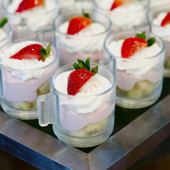 many servings of sweet tasty dessert on buffet
