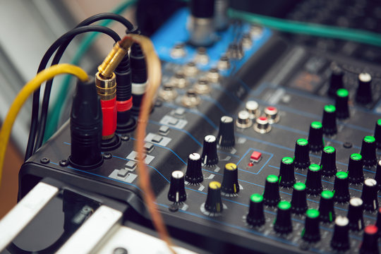 Close-up of audio mixing desk. Selective focus