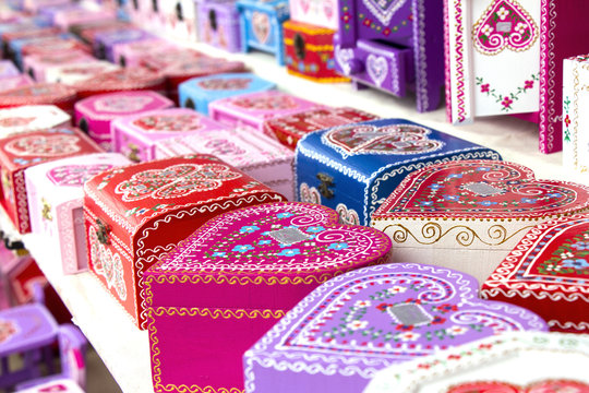 Wooden gift boxes painted with traditional Croatian decorations, as souvenir