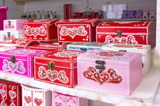 Wooden gift boxes painted with traditional Croatian decorations, as souvenir