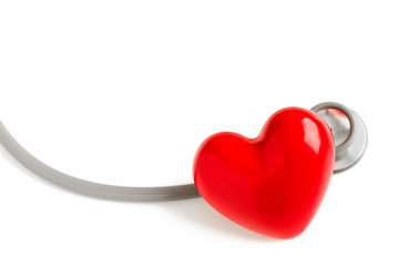 Stethoscope and red heart isolated on white background
