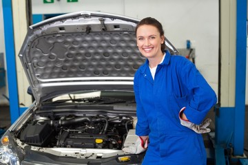 Mechanic smiling at the camera