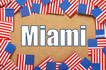 Fototapeta na wymiar The name Miami with a border of USA Flags
