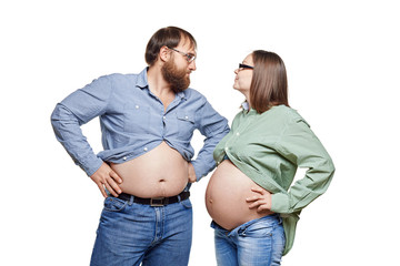 young family waiting for baby on a white background