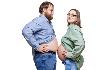 young family waiting for baby on a white background