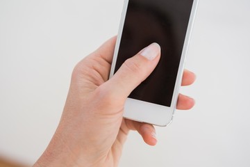 Hand of woman holding mobile phone