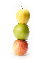 different varieties of apples isolated on white background
