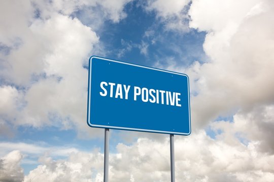 Stay positive against blue sky with white clouds