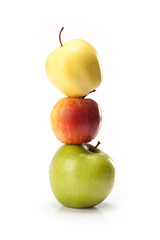 different varieties of apples isolated on white background