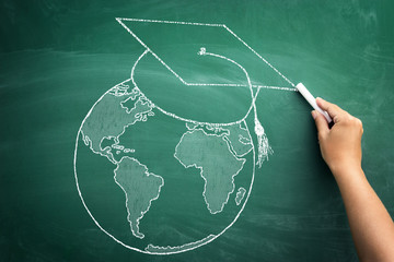 world globe with graduation cap