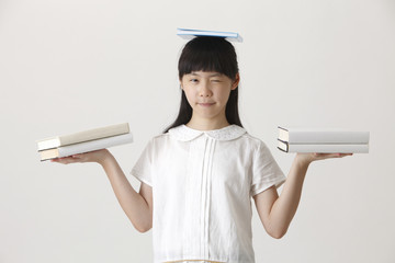 book on her head