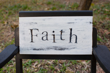 faith letter on the vintage chair