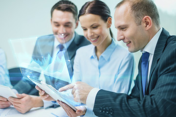Fototapeta premium business team with tablet pc having discussion