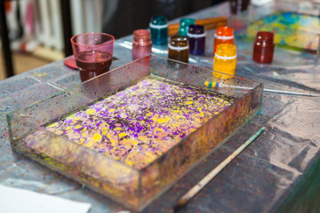 Ready marbling drawing on water surface, the ebru art