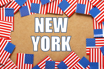 The name New York with a border of USA Flags