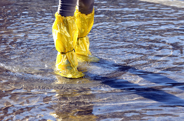 young woman with leggings at high tide in Venice