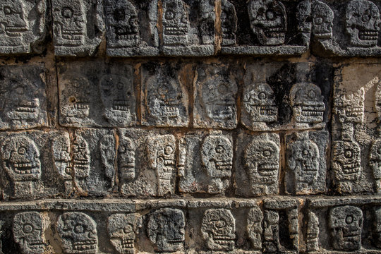 Skulls texture carved stone