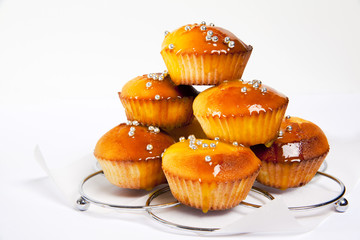 vanilla muffin with hot orange custard isolated on white